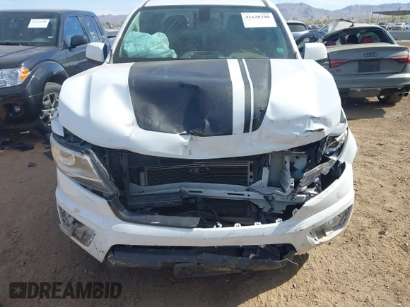 2018 Chevrolet Colorado 2WD Z71 with VIN 1GCGSDEN6J1173358, listed as a IAAI auction lot 41620340 with 93,185 mi miles and . Bid and sale history available at DreamBid. Image 6.