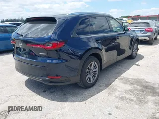 2025 Mazda CX-90 Preferred z VIN JM3KKBHD7S1200318, wystawiony jako IAAI lot #42045306 z przebiegiem 4 886 mil mil oraz . Historia ofert i sprzedaży dostępna na DreamBid. Obrazek 4.