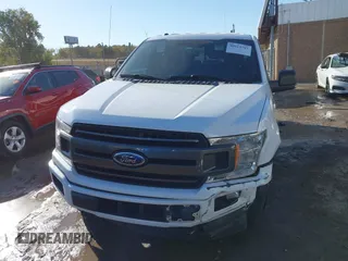 2018 Ford F-150 XL with VIN 1FTEW1EG1JKE29623, listed as a IAAI auction lot 40615703 with 122,846 mi miles and . Bid and sale history available at DreamBid. Image 12.