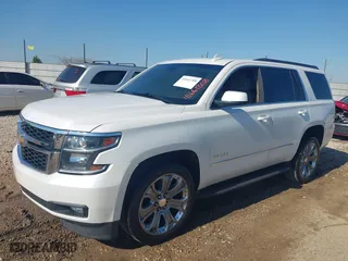 2020 Chevrolet Tahoe LT with VIN 1GNSCBKC9LR196546, listed as a IAAI auction lot 41661308 with 132,714 mi miles. Bid and sale history available at carsss.com. Image 2.