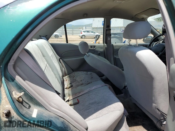 2000 Ford Escort with VIN 3FAFP13P6YR167405, listed as a Copart auction lot 60447535 with 128,413 mi miles and Clean title. Bid and sale history available at DreamBid. Image 10.