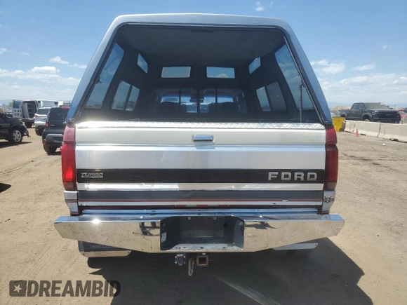 1994 Ford F-350 with VIN 1FTJW36K7REA33204, listed as a Copart auction lot 60685305 with 131,425 mi miles and Clean title. Bid and sale history available at DreamBid. Image 6.