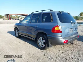 2003 Hyundai Santa Fe GLS with VIN KM8SC73D33U469955, listed as a IAAI auction lot 41989360 with 66,798 mi miles. Bid and sale history available at carsss.com. Image 3.