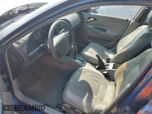 2001 Daewoo Nubira CDX z VIN KLAJB52Z31K647237, wystawiony jako Copart lot #69299834 z przebiegiem 51 513 mil mil oraz Szkody całkowita. Historia ofert i sprzedaży dostępna na DreamBid. Obrazek 8.