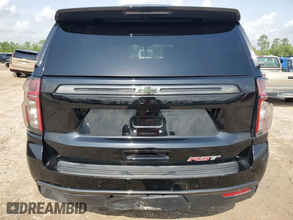 2022 Chevrolet Suburban RST with VIN 1GNSCEKD1NR304560, listed as a Copart auction lot 54498525 with 83,522 mi miles and Salvage title. Bid and sale history available at DreamBid. Image 6.