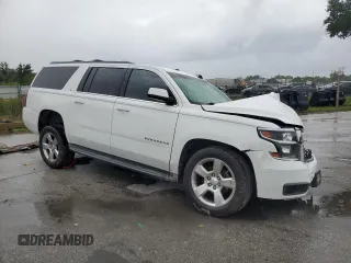 2015 Chevrolet Suburban LT with VIN 1GNSCJKC7FR203718, listed as a Copart auction lot 59577225 with Not provided miles and Salvage title. Bid and sale history available at DreamBid. Image 4.