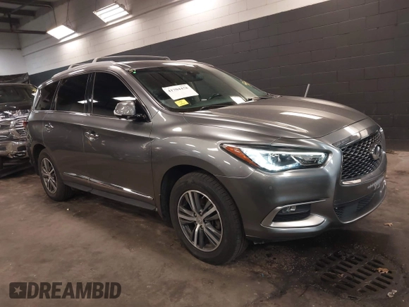 2016 Infiniti QX60 with VIN 5N1AL0MM1GC526389, listed as a IAAI auction lot 41704458 with 103,931 mi miles and . Bid and sale history available at DreamBid. Image 1.
