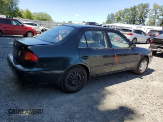 1999 Toyota Corolla VE with VIN 1NXBR12E7XZ240321, listed as a Copart auction lot 64259115 with 144,145 mi miles and Salvage title. Bid and sale history available at DreamBid. Image 3.