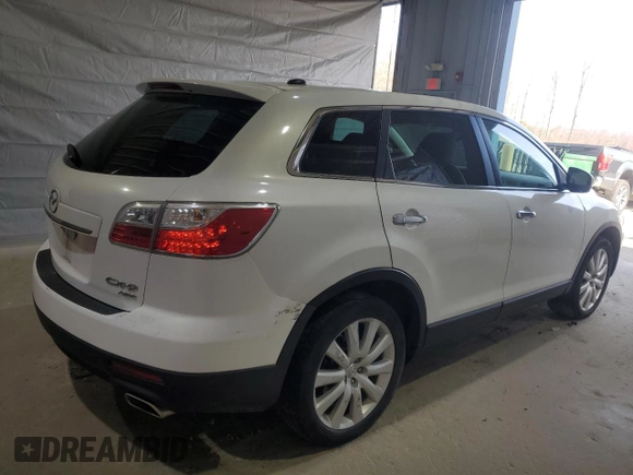 2010 Mazda CX-9 Grand Touring z VIN JM3TB3MV1A0216883, wystawiony jako Copart lot #53688975 z przebiegiem 175 158 mil mil oraz Szkoda całkowita • Salvage title. Historia ofert i sprzedaży dostępna na DreamBid. Obrazek 3.