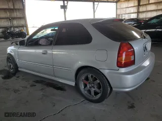 1996 Honda Civic DX with VIN 2HGEJ634XTH105568, listed as a Copart auction lot 69697714 with 130,880 mi miles and Salvage Title. Bid and sale history available at carsss.com. Image 2.