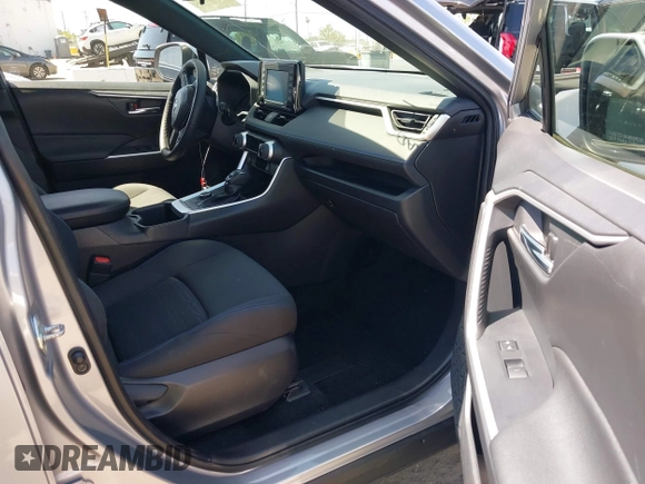 2022 Toyota RAV4 Hybrid SE with VIN JTM16RFV7ND062263, listed as a IAAI auction lot 42068485 with 25,282 mi miles and . Bid and sale history available at DreamBid. Image 5.