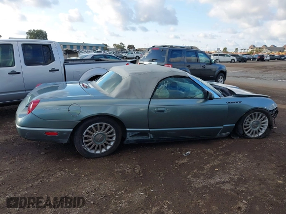 2004 Ford Thunderbird Pacific Coast Roadster with VIN 1FAHP63AX4Y107544, listed as a IAAI auction lot 41441354 with Not Provided miles and . Bid and sale history available at DreamBid. Image 13.