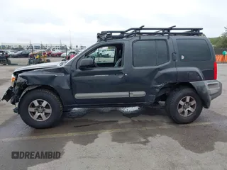 2012 Nissan Xterra S with VIN 5N1AN0NW4CC523071, listed as a IAAI auction lot 41874263 with 154,556 mi miles and . Bid and sale history available at DreamBid. Image 6.