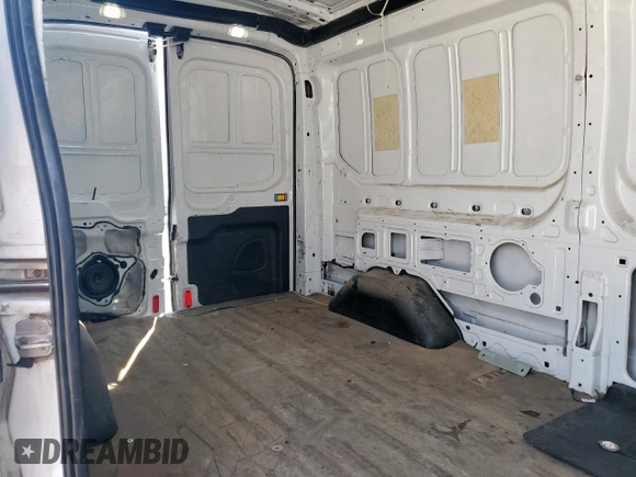 2015 Ford Transit Cargo with VIN 1FTNR2CG0FKA71695, listed as a Copart auction lot 57117985 with 149,901 mi miles and Salvage title. Bid and sale history available at DreamBid. Image 11.