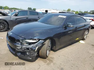 2017 BMW 4 Series 440i with VIN WBA4E3C59HG187055, listed as a Copart auction lot 62296834 with 84,960 mi miles and Salvage title. Bid and sale history available at DreamBid. Image 1.