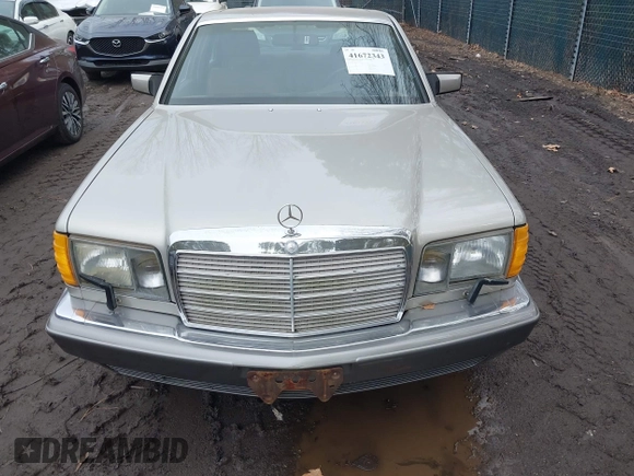 1987 Mercedes-Benz 560 with VIN WDBCA39D5HA357048, listed as a IAAI auction lot 41672343 with 151,635 mi miles and . Bid and sale history available at DreamBid. Image 6.