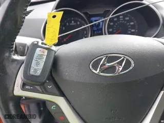 2016 Hyundai Veloster with VIN KMHTC6AD8GU301106, listed as a IAAI auction lot 41067109 with 139,002 mi miles. Bid and sale history available at carsss.com. Image 11.