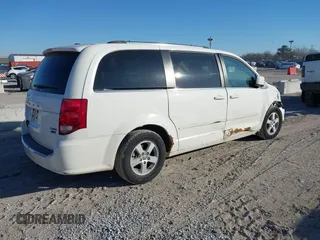 2011 Dodge Grand Caravan Crew with VIN 2D4RN5DG8BR699905, listed as a IAAI auction lot 41543376 with 234,273 mi miles and . Bid and sale history available at DreamBid. Image 4.