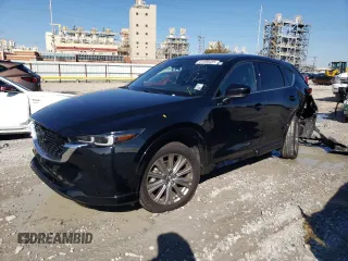 2023 Mazda CX-5 Signature with VIN JM3KFBXYXP0290991, listed as a Copart auction lot 41408485 with 19,952 mi miles and Salvage Title. Bid and sale history available at carsss.com. Image 1.