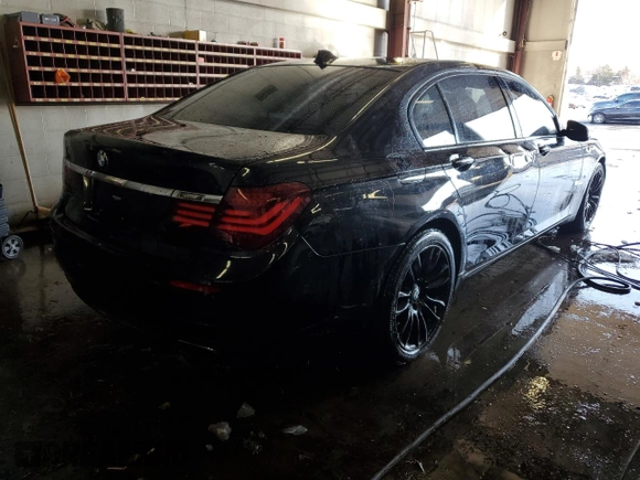 2014 BMW 7 Series ALPINA B7 xDrive with VIN WBAYF8C59ED141718, listed as a Copart auction lot 89348655 with 77,954 mi miles and Salvage Title. Bid and sale history available at DreamBid. Image 3.