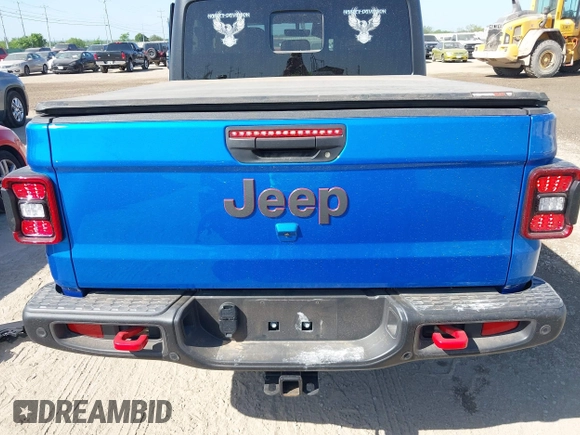 2023 Jeep Gladiator Rubicon with VIN 1C6JJTBG3PL581023, listed as a IAAI auction lot 41963931 with 15,023 mi miles and . Bid and sale history available at DreamBid. Image 17.