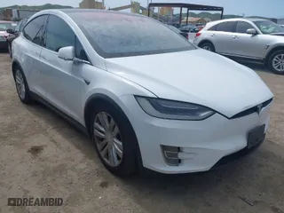 2016 Tesla Model X 70D with VIN 5YJXCBE24GF002020, listed as a IAAI auction lot 41799528 with 149,556 mi miles. Bid and sale history available at carsss.com. Image 1.