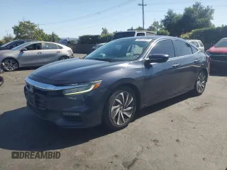 2019 Honda Insight Touring with VIN 19XZE4F90KE015579, listed as a Copart auction lot 58821075 with 26,560 mi miles and Salvage title. Bid and sale history available at DreamBid. Image 1.