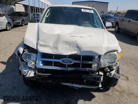 2012 Ford Escape XLS z VIN 1FMCU0C76CKB12316, wystawiony jako Copart lot #65011265 z przebiegiem 139 992 mil mil oraz Szkoda całkowita • Salvage title. Historia ofert i sprzedaży dostępna na DreamBid. Obrazek 5.