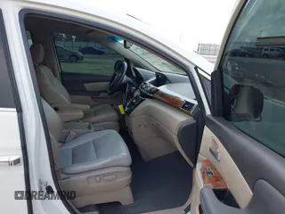 2011 Honda Odyssey EX-L with VIN 5FNRL5H67BB011070, listed as a IAAI auction lot 42491685 with 200,671 mi miles and . Bid and sale history available at DreamBid. Image 5.