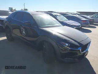 2025 Mazda CX-30 2.5 S Select Sport with VIN 3MVDMBBM0SM760087, listed as a IAAI auction lot 41263107 with 1,208 mi miles. Bid and sale history available at carsss.com. Image 1.