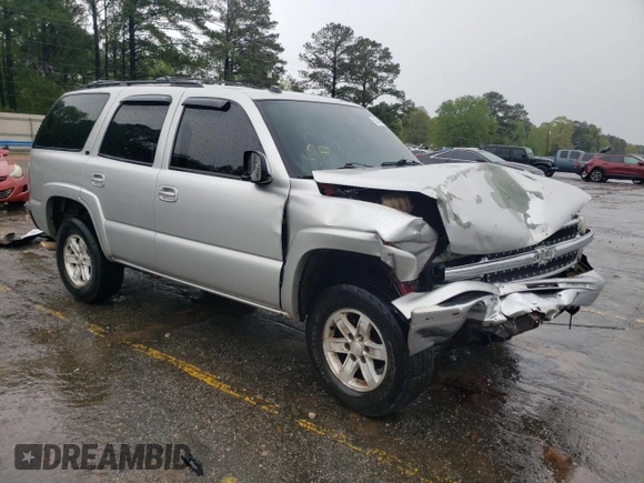 2004 Chevrolet Tahoe LT with VIN 1GNEC13Z34J124204, listed as a Copart auction lot 50416135 with 310,955 mi miles and Salvage title. Bid and sale history available at DreamBid. Image 4.
