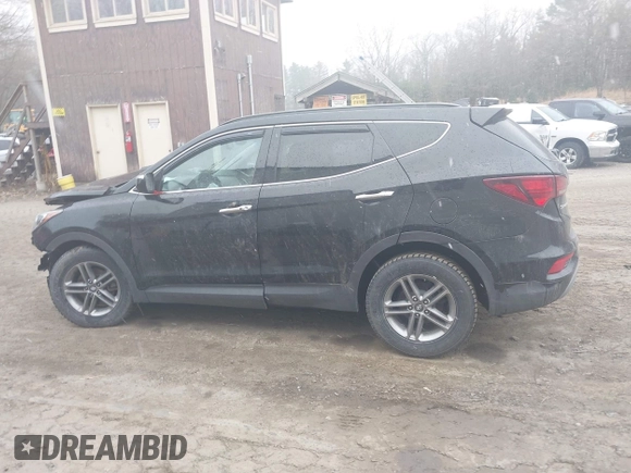 2018 Hyundai Santa Fe 2.4L z VIN 5NMZUDLB7JH098638, wystawiony jako IAAI lot #42055793 z przebiegiem 63 516 mil mil oraz . Historia ofert i sprzedaży dostępna na DreamBid. Obrazek 14.