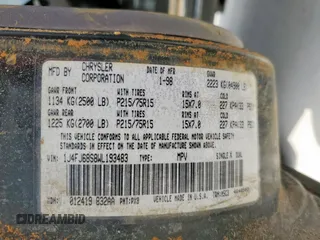 1998 Jeep Cherokee Sport z VIN 1J4FJ68S8WL193483, wystawiony jako Copart lot #58368705 z przebiegiem 94 462 mil mil oraz Szkoda całkowita • Salvage title. Historia ofert i sprzedaży dostępna na DreamBid. Obrazek 13.