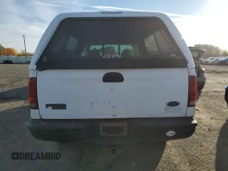2001 Ford Super Duty F-250 XL with VIN 1FTNX21L51EA29472, listed as a Copart auction lot 77810274 with 241,055 mi miles and Salvage Title. Bid and sale history available at carsss.com. Image 6.