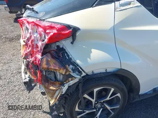 2018 Toyota C-HR XLE z VIN NMTKHMBXXJR041817, wystawiony jako IAAI lot #42174035 z przebiegiem 86 669 mil mil oraz . Historia ofert i sprzedaży dostępna na DreamBid. Obrazek 12.