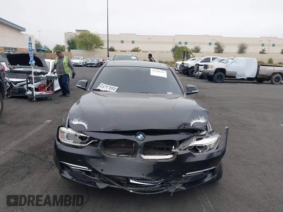 2014 BMW 3 Series 328i xDrive with VIN WBA3B5C51EP543364, listed as a IAAI auction lot 42138365 with 145,243 mi miles and . Bid and sale history available at DreamBid. Image 13.