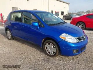 2012 Nissan Versa S with VIN 3N1BC1CP2CK284357, listed as a IAAI auction lot 41911223 with 164,806 mi miles. Bid and sale history available at carsss.com. Image 1.