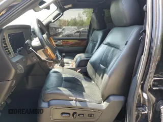2014 Lincoln Navigator z VIN 5LMJJ2J58EEL00184, wystawiony jako Copart lot #54724025 z przebiegiem 200 772 mil mil oraz Szkoda całkowita • Salvage title. Historia ofert i sprzedaży dostępna na DreamBid. Obrazek 7.