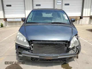 2006 Honda Odyssey EX with VIN 5FNRL38416B446272, listed as a Copart auction lot 57165545 with 219,042 mi miles and Salvage title. Bid and sale history available at DreamBid. Image 5.