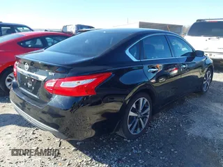 2016 Nissan Altima SR with VIN 1N4AL3AP6GC274181, listed as a IAAI auction lot 41822882 with 113,641 mi miles and . Bid and sale history available at carsss.com. Image 4.