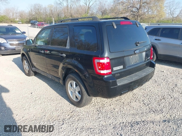 2008 Ford Escape XLT with VIN 1FMCU93138KD65438, listed as a IAAI auction lot 42073549 with 185,343 mi miles. Bid and sale history available at carsss.com. Image 3.