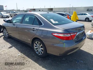 2015 Toyota Camry XLE with VIN 4T1BF1FK0FU952421, listed as a IAAI auction lot 41714622 with 125,553 mi miles and . Bid and sale history available at DreamBid. Image 3.