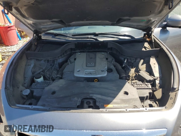 2014 Infiniti QX70 with VIN JN8CS1MU1EM451534, listed as a Copart auction lot 52677335 with 118,862 mi miles and Salvage Title. Bid and sale history available at DreamBid. Image 12.