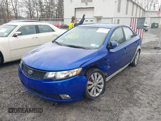 2010 Kia Forte SX with VIN KNAFW4A38A5142042, listed as a IAAI auction lot 41711307 with 162,765 mi miles. Bid and sale history available at carsss.com. Image 6.
