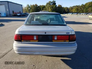 1995 Ford Escort z VIN 3FASP13J0SR159107, wystawiony jako Copart lot #76715394 z przebiegiem 353 430 mil mil oraz Szkody całkowita. Historia ofert i sprzedaży dostępna na DreamBid. Obrazek 6.