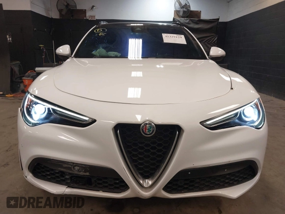2020 Alfa Romeo Stelvio Ti z VIN ZASPAKBN9L7C92041, wystawiony jako IAAI lot #41329129 z przebiegiem 47 977 mil mil oraz . Historia ofert i sprzedaży dostępna na DreamBid. Obrazek 12.