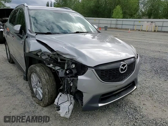2014 Mazda CX-5 Touring z VIN JM3KE4CY0E0407169, wystawiony jako Copart lot #57877215 z przebiegiem 168 277 mil mil oraz Szkoda całkowita • Salvage title. Historia ofert i sprzedaży dostępna na DreamBid. Obrazek 14.