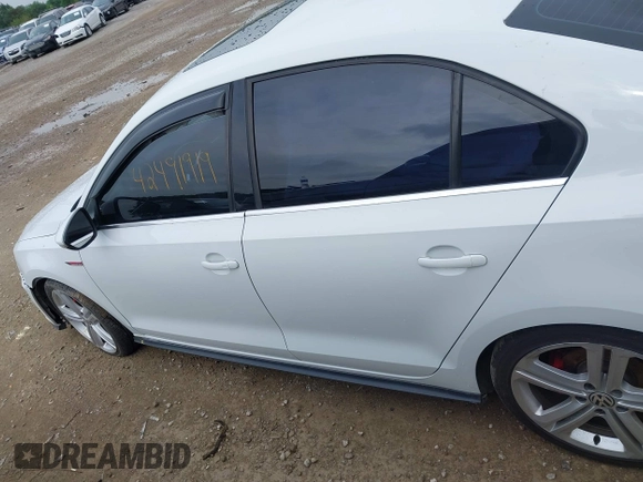 2017 Volkswagen Jetta GLI z VIN 3VW4T7AJ8HM349440, wystawiony jako IAAI lot #42491919 z przebiegiem 141 764 mil mil oraz . Historia ofert i sprzedaży dostępna na DreamBid. Obrazek 15.