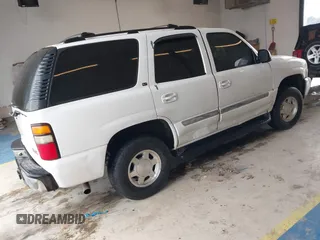 2004 GMC Yukon SLE z VIN 1GKEC13V64R107506, wystawiony jako IAAI lot #41407353 z przebiegiem 215 127 mil mil oraz . Historia ofert i sprzedaży dostępna na DreamBid. Obrazek 4.