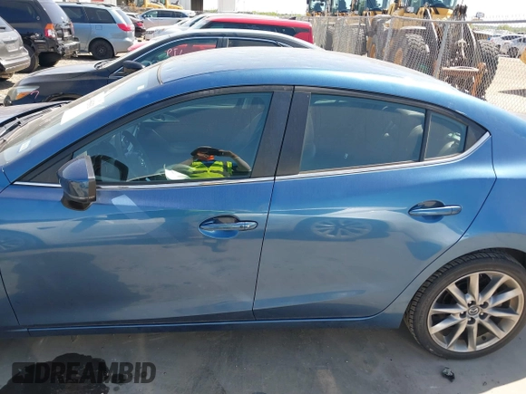 2018 Mazda 3 Touring with VIN 3MZBN1V38JM206827, listed as a IAAI auction lot 41983631 with 51,303 mi miles and . Bid and sale history available at DreamBid. Image 14.